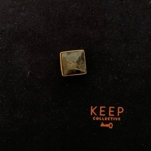 KEEP Collective pyramid wishing stone charm in larvikite, representing “balance”